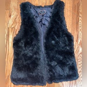 Black fur vest